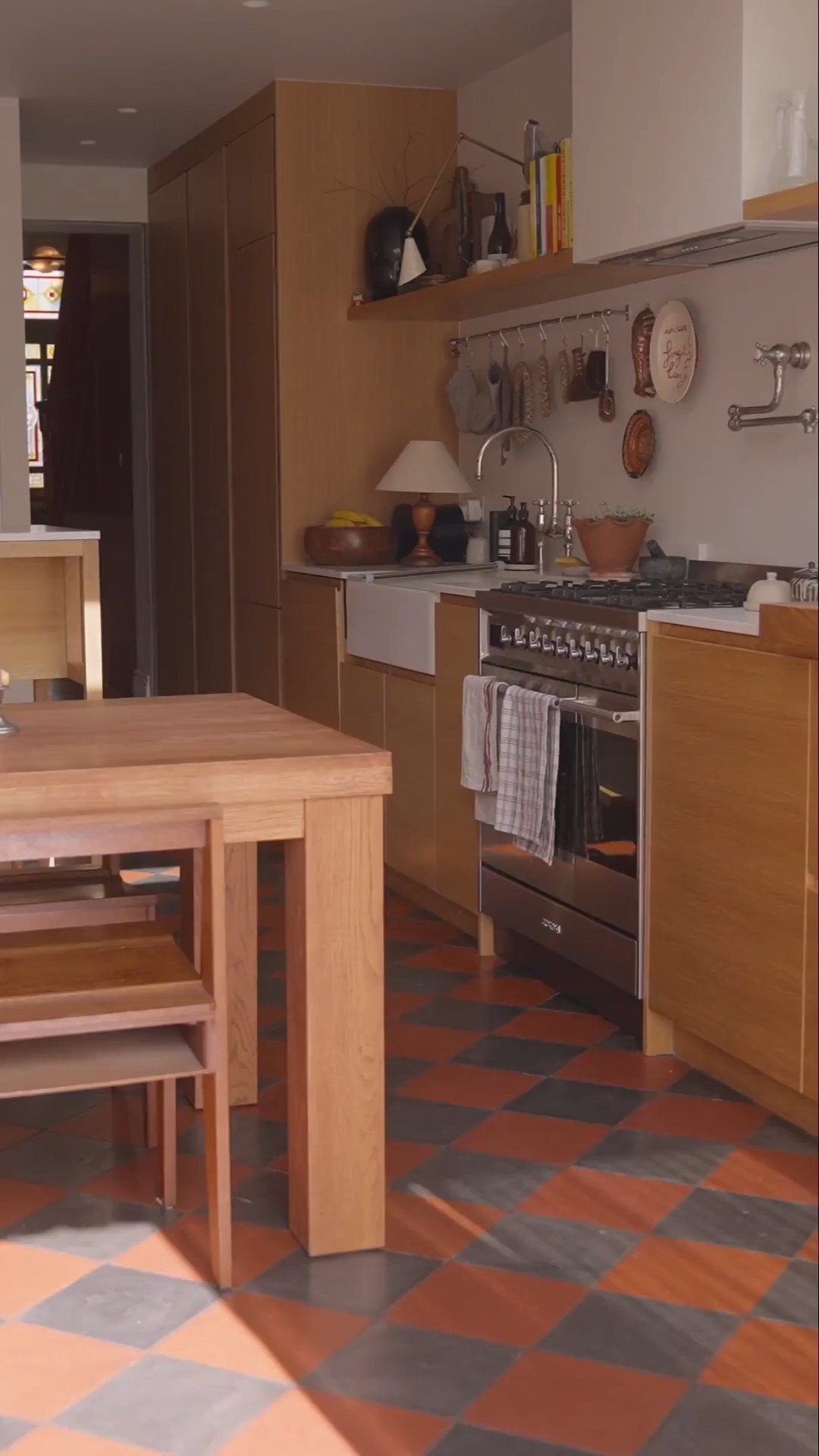 Instagram post by @doingupdenbigh for House Beautiful. Caption reads: A kitchen made for gathering, a home built around....