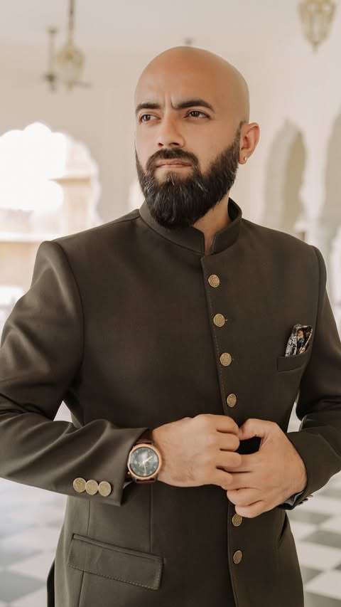 Instagram post by @nitinaroraphotography for Manyavar. Caption reads: [...] royal vibes in this bandhgala from Manyavar,....