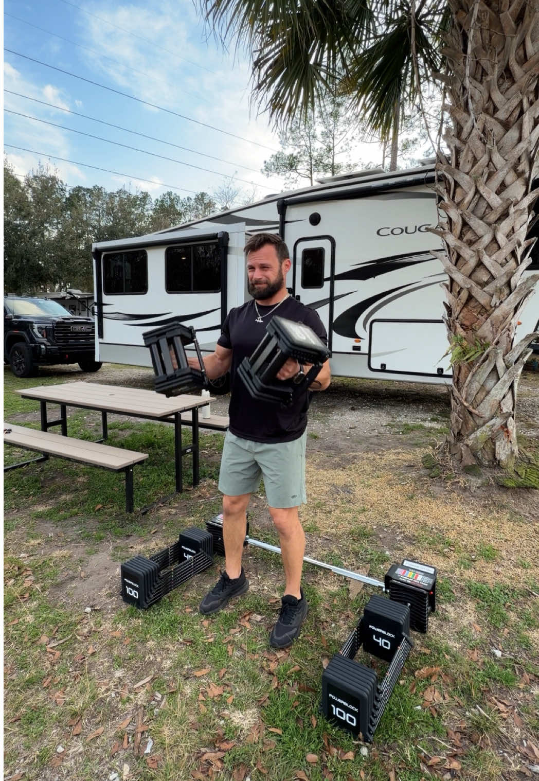 TikTok post by @ryaniswandering for PowerBlock. Caption reads: The Powerblock barbell attachment makes them MORE....