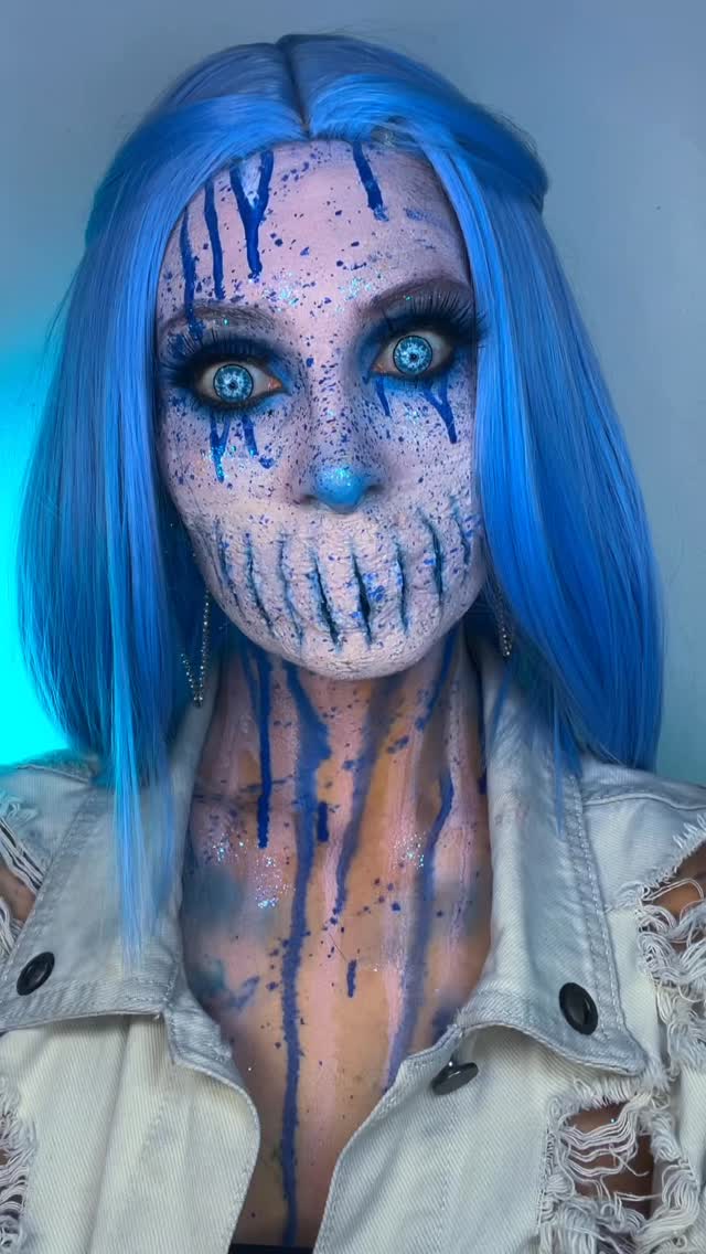 Instagram post by @sparklywinona for Haniix. Caption reads: [...] makeup for Halloween 🎃 Contact lenses....