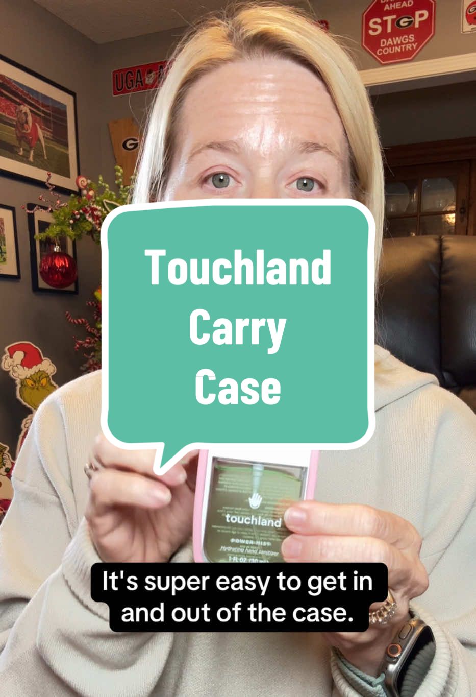 TikTok post by @gen_x_mom_72 for Touchland. Caption reads: @touchland hand sanitizer carry case is [...].