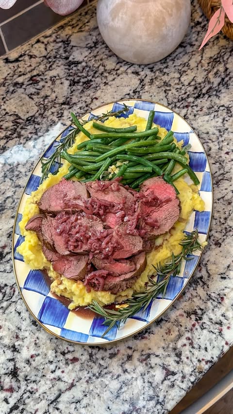 Instagram post by @taylorjackzen for The Feedfeed. Caption reads: (ad) This Beef Tenderloin is dressed with a red....