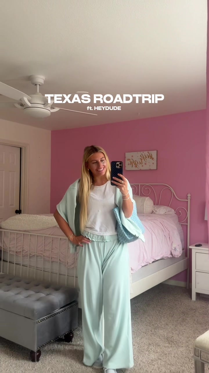 TikTok post by @kellypickup1 for HEYDUDE shoes. Caption reads: a very fun road trip heading to meet my best....