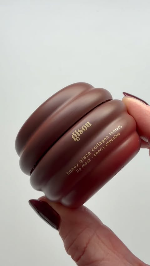 Instagram post by @theglow_scientist for Gisou. Caption reads: @gisou Honey glaze collagen therapy lip mask in....