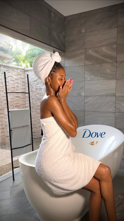 Instagram post by @sally_ngila for Dove. Caption reads: [...] glow. Keeping it simple and gentle with Dove....