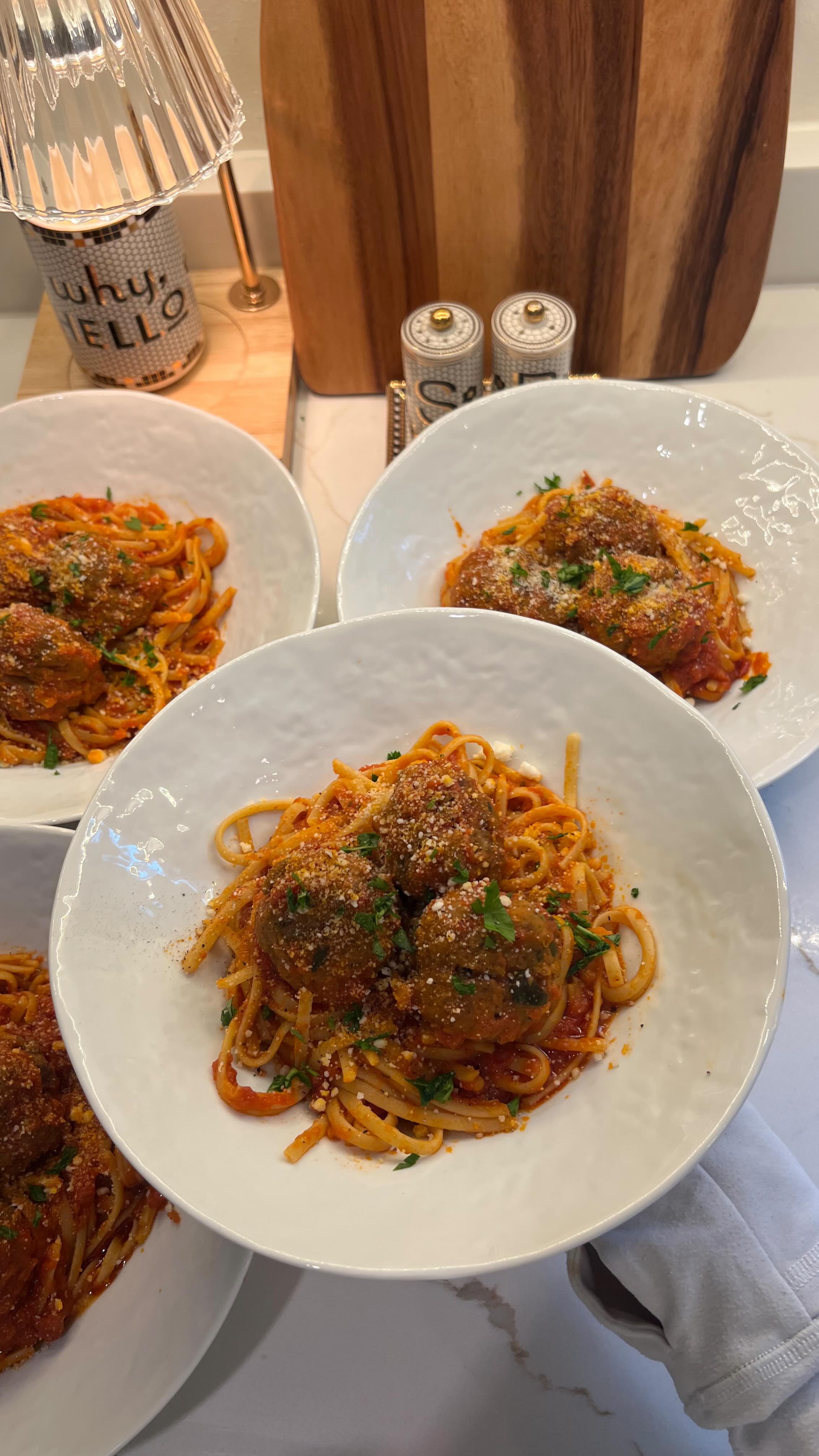 Instagram post by @claudiaaharrington for ButcherBox. Caption reads: Spaghetti and meatballs: a classic dinner, but....