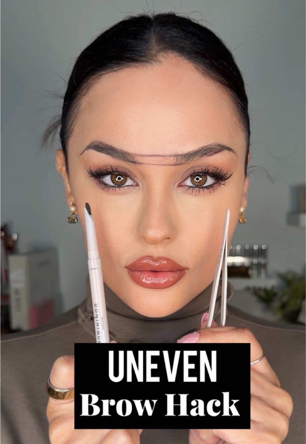 TikTok post by @christendominique for Dominique Cosmetics. Caption reads: [...] time! 😌🙂‍↕️ Brow Frame Pencil @Dominique....