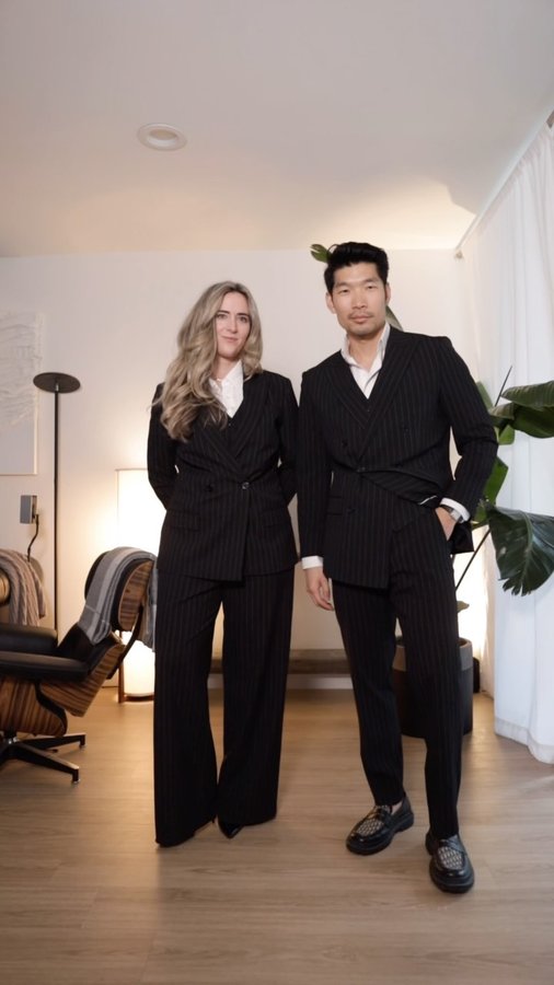Instagram post by @levitatestyle for Suitshop. Caption reads: [...] in matching couple’s power suits from....