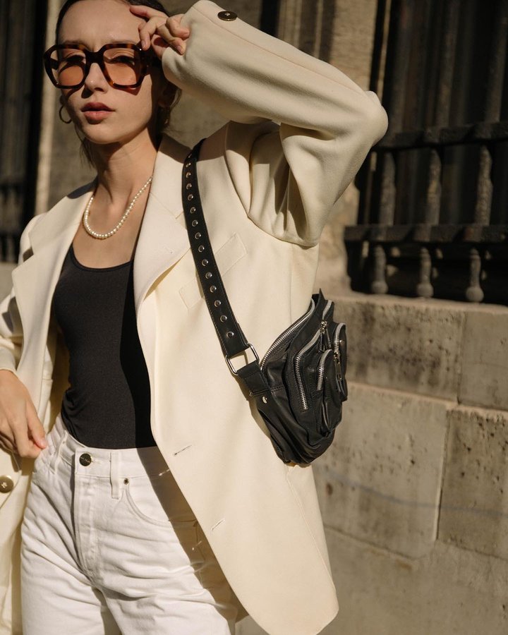 Instagram post by @beatrice.gutu for Nunoobags. Caption reads: Where to next? 👁 @nunoobags #nunoobags #pfw.