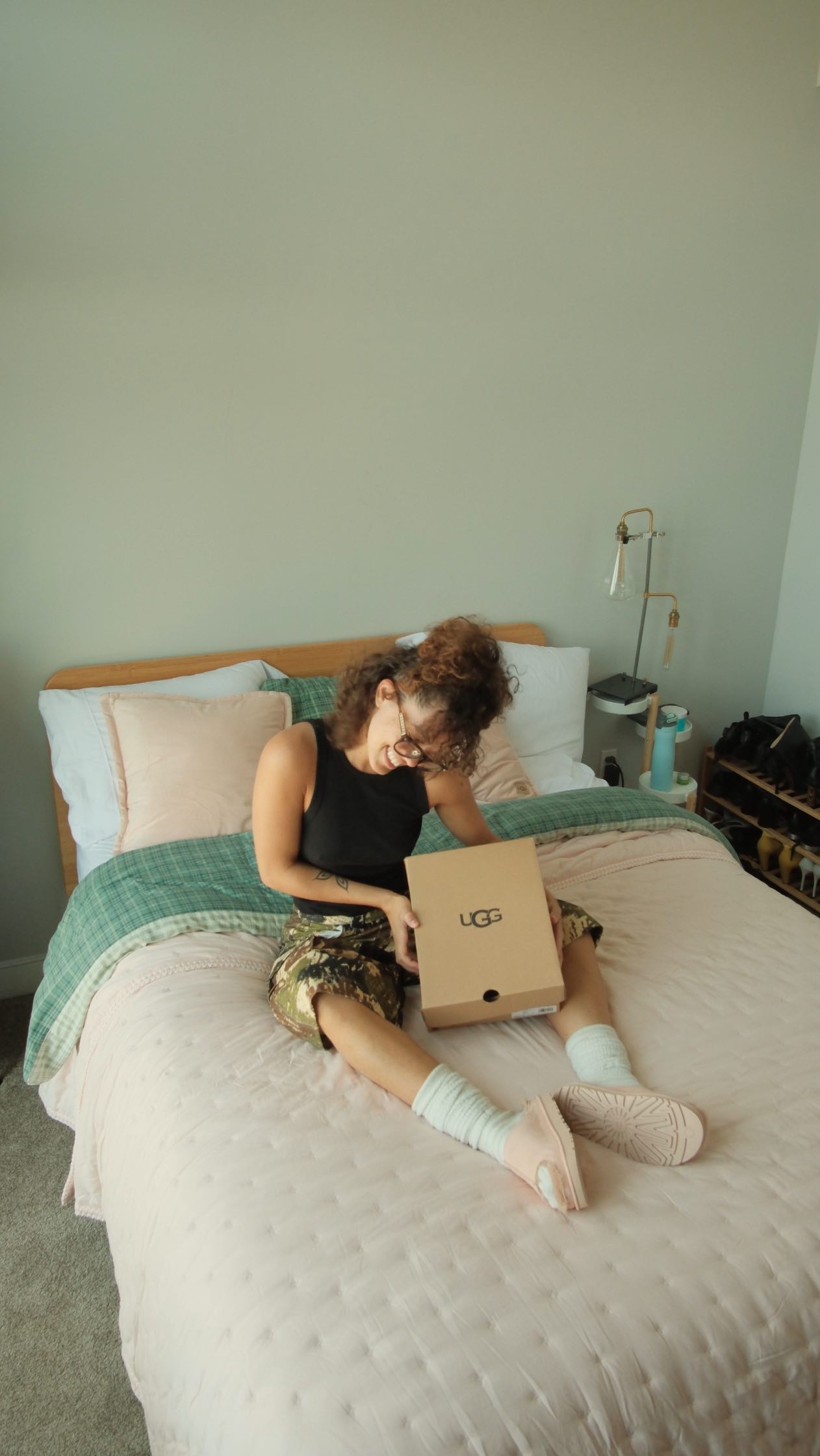 Instagram post by @claralilywest for Afterpay. Caption reads: Making my new place feel like home with @ugg....