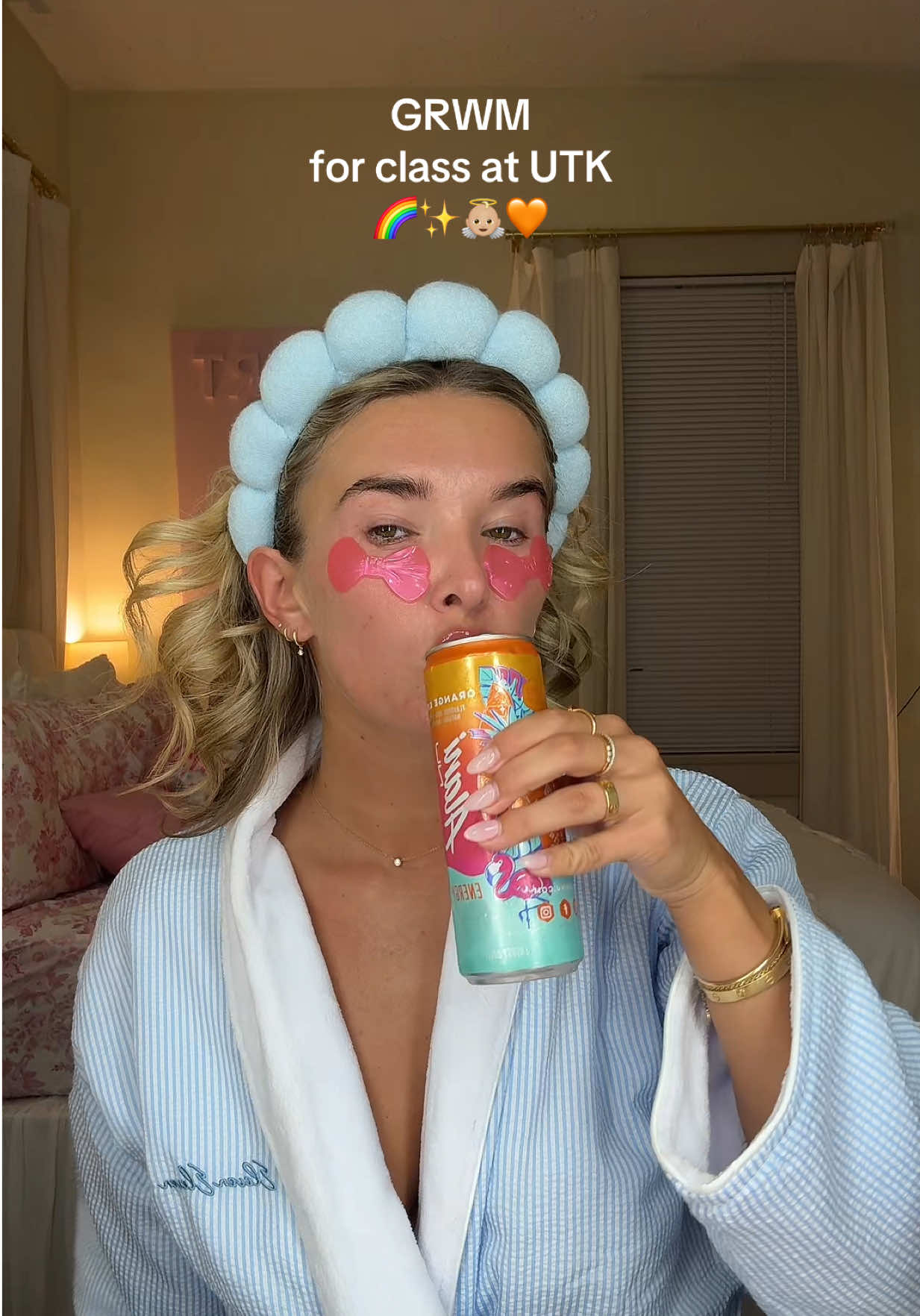 TikTok post by @laniekristin for Alani Nu. Caption reads: [...] the university of tennessee🌈✨👼🏼🧡 @Alani....