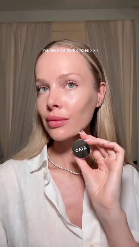 Instagram post by @katiedaisy for CAIA COSMETICS. Caption reads: [...] bright under eye hack I swear by ✨....