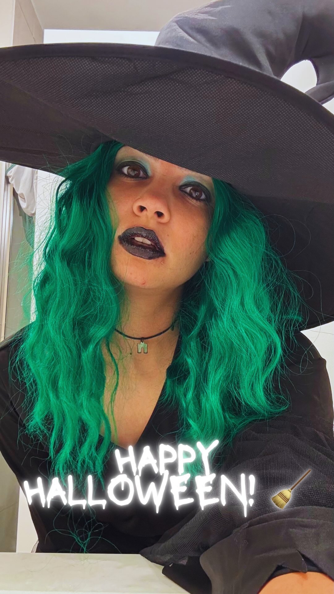Instagram post by @the_quirkyexplorer for Spirit Halloween. Caption reads: Here’s Witching you a Happyy Halloween!....