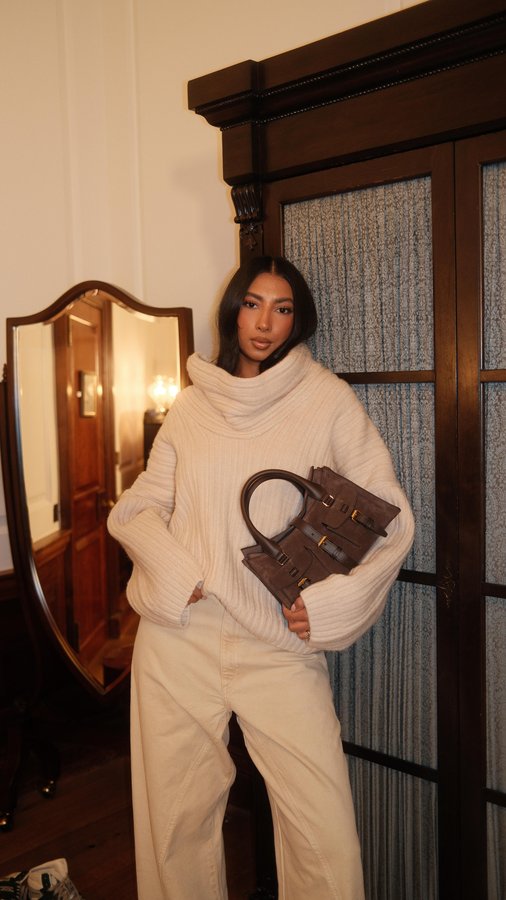 Instagram post by @noorieana for Mulberry. Caption reads: Ad. Endless styling options this season with the....