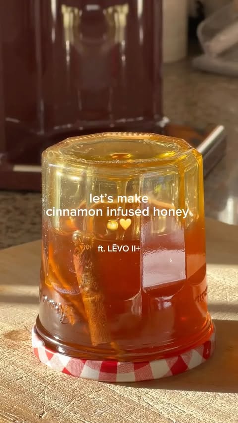 Instagram post by @nutsfornazook for LĒVO. Caption reads: cinnamon infused honey ft. @levo_oil 🍯💛 infusing....