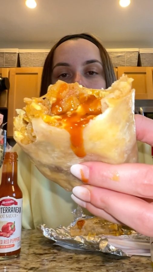 Instagram post by @katenorkeliunas for Mezzetta. Caption reads: 3 new @mezzetta hot sauces go perfectly with my....