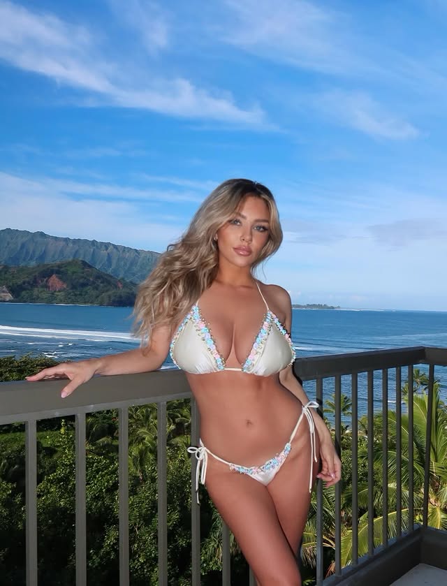 Instagram post by @ashlyn_dupont for Beach Bunny Swimwear. Caption reads: my own little paradise 🌺 @beachbunnyswimwear ad....