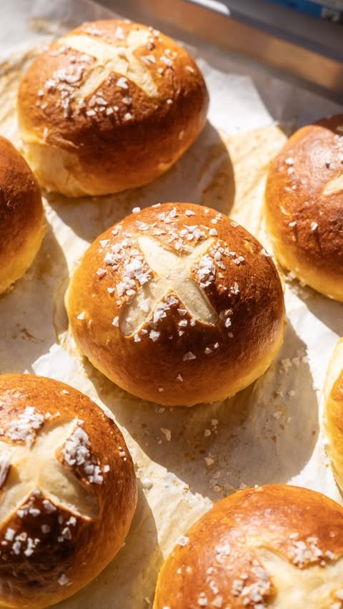 Instagram post by @kitchen_bythesea for King Arthur Baking Company. Caption reads: 🥨 The best thing we made all month are these soft....