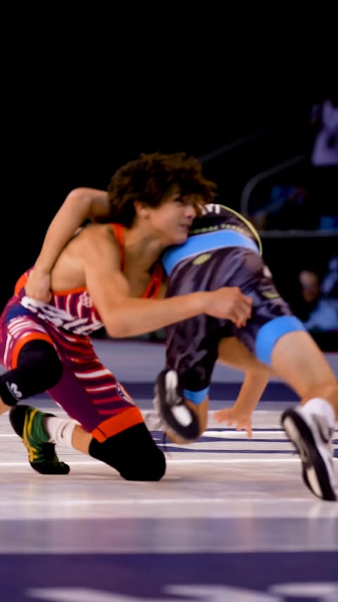 Instagram post by @pausaw_ for FloWrestling. Caption reads: Leonidas Murillo keeps the pace and holds strong....