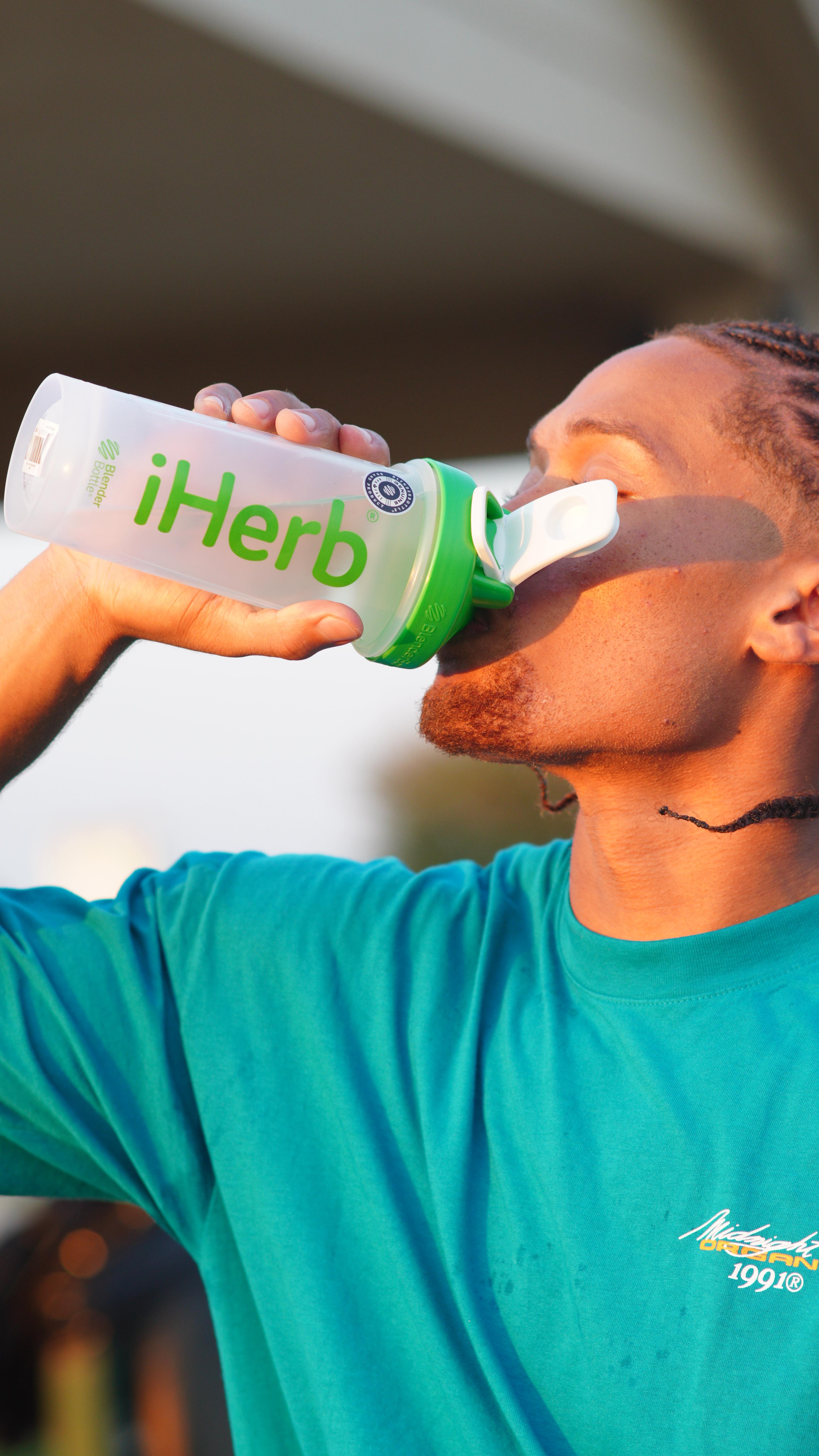 Instagram post by @jojowms23 for iHerb. Caption reads: iHerb keeps me ready for game day 💪🏽 My go-to’s....