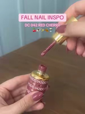 TikTok post by @uhlenuh for DND Gel. Caption reads: [...] on my nails and this is it!😍😍🍒 @DNDGel....