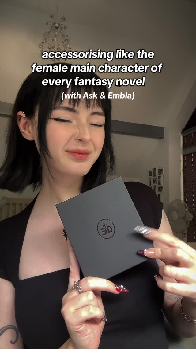 Instagram post by @bookswithgray for Ask and Embla. Caption reads: putting on my plot armour with @askemblastore....