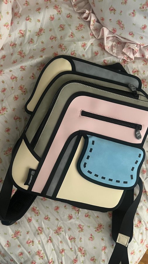 Instagram post by @larue.estee for JumpFromPaper. Caption reads: #gifted The Flip Backpack from @jumpfrompaper is....