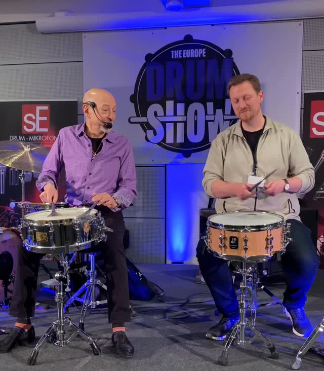 Instagram post by @stevesmithdrums for Vic Firth. Caption reads: A brush lesson from two experts @stevesmithdrums &....