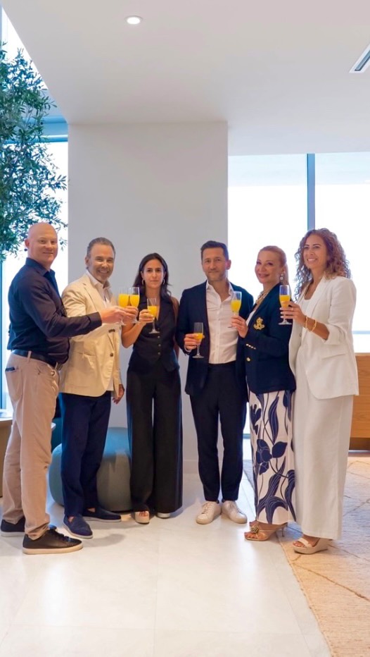 Instagram post by @ruthie.assouline for Douglas Elliman. Caption reads: A Toast to Summer 🥂

Thank you to everyone who....