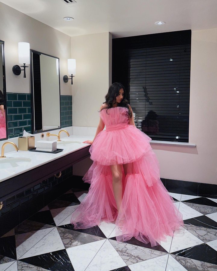 Instagram post by @manishakarani for BRONXANDBANCO. Caption reads: [...] dress doesn’t exis-
.
.
.
#revolveme....