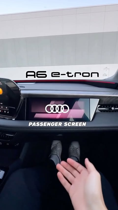 Instagram post by @alllcarnews for Audi USA. Caption reads: Audi’s NEW Passenger Screen - 2025 A6 e-Tron⚡️....