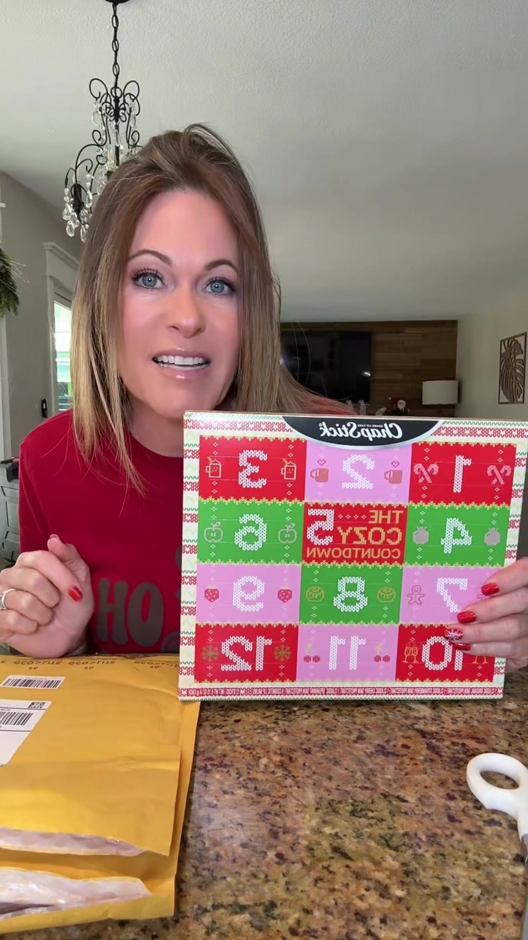 TikTok post by @doingthemomjob for ChapStick. Caption reads: It’s 12 days of Chapstick and everybody needs....
