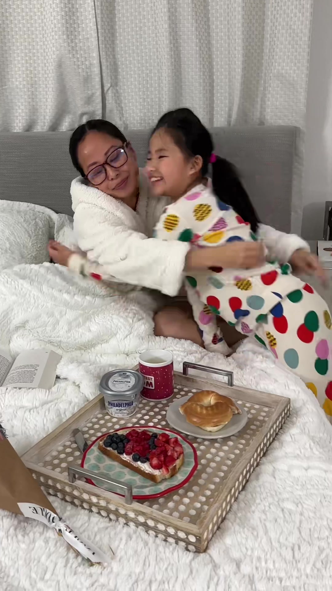 TikTok post by @inrachelshoes for Philadelphia. Caption reads: #ad There's something so satisfying about a bagel....