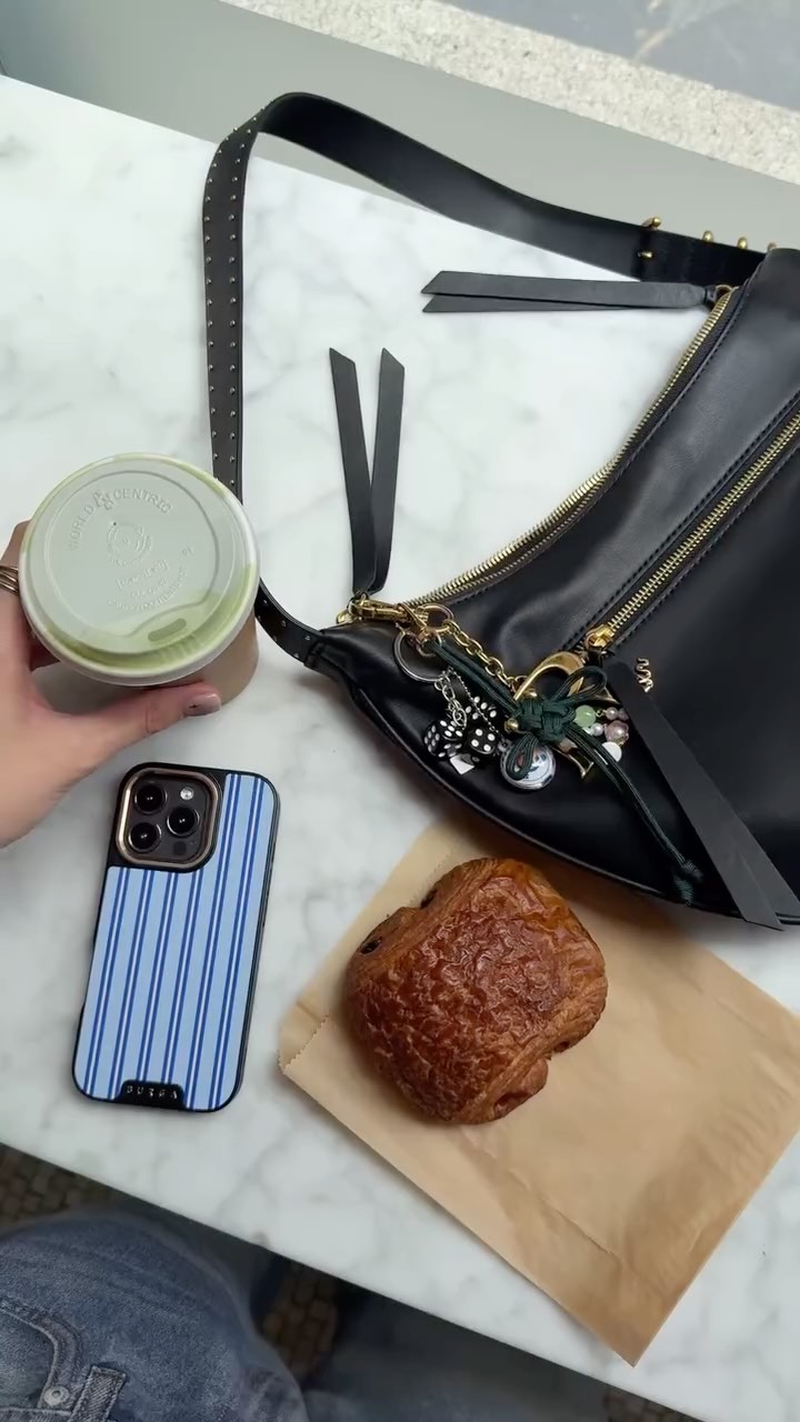 Instagram post by @rae.hersey for Rag Bone. Caption reads: come with me behind the scenes for a content day....