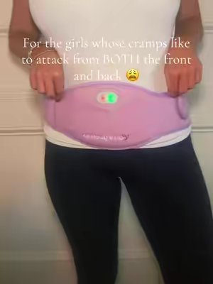 TikTok post by @laurenm2405 for Comfytemp. Caption reads: [...] #cramps #backpainrelief #stomachpain....