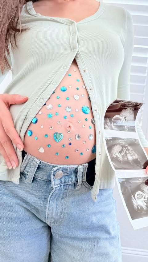 Instagram post by @jensnomz for nuuly. Caption reads: bumpmaxxing✨🧚🏼‍♂️ @nuuly #bedazzled #pregnant....