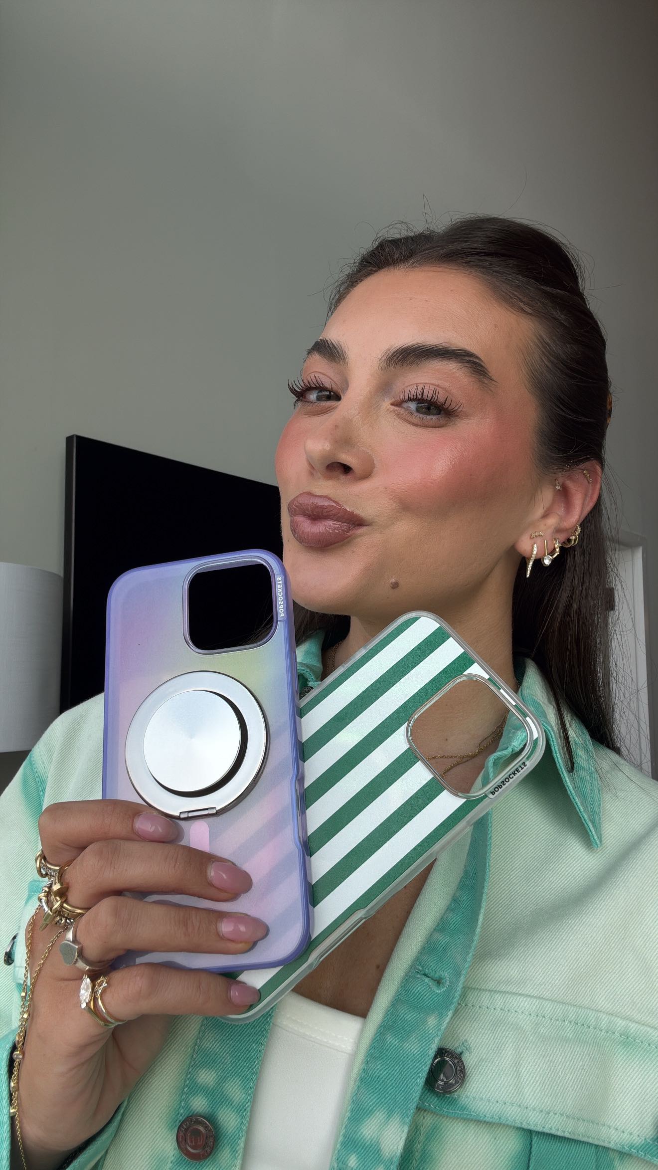 Instagram post by @kay_caputo for PopSockets. Caption reads: @popsockets changing the game for us girlies who....