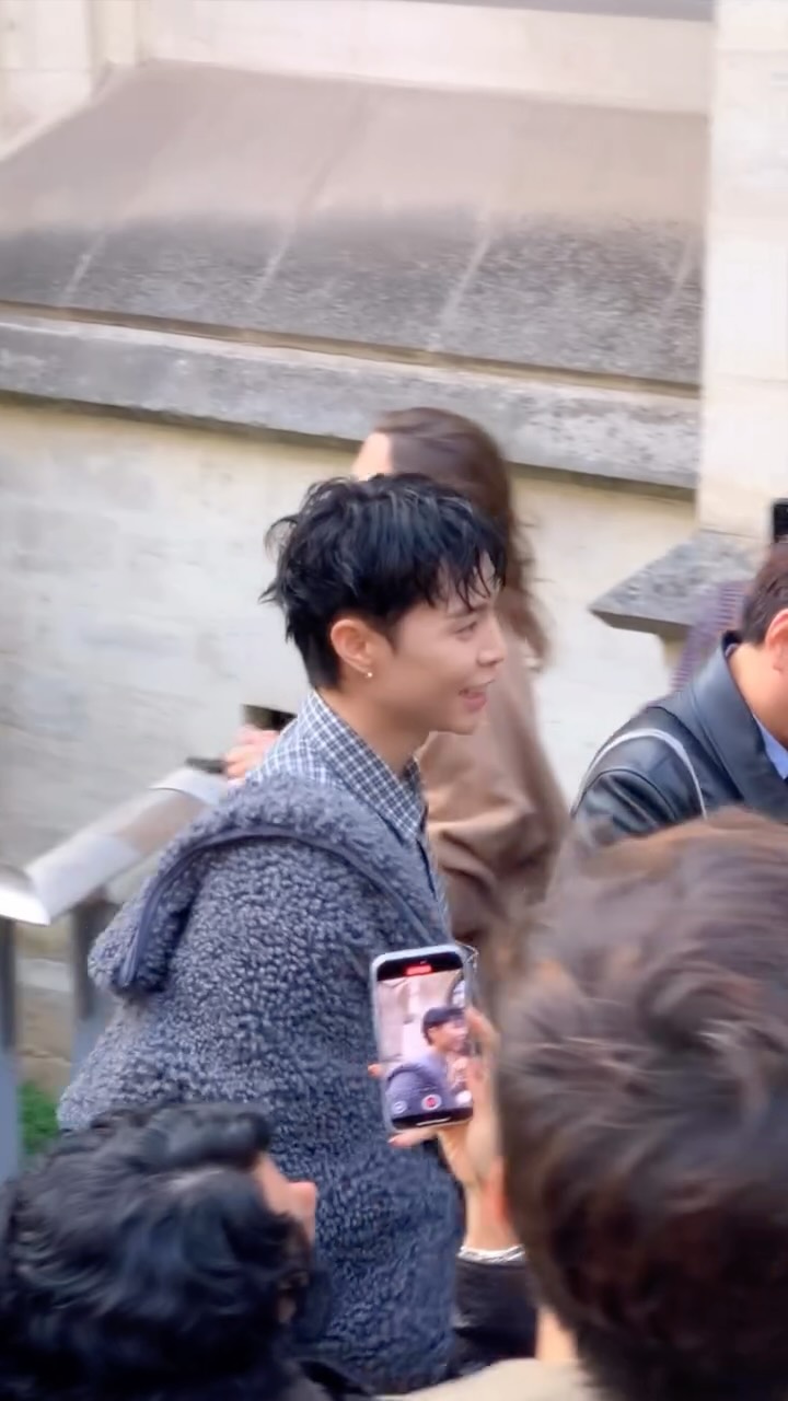 Instagram post by @nct for Acne Studios. Caption reads: #JOHNNY with....