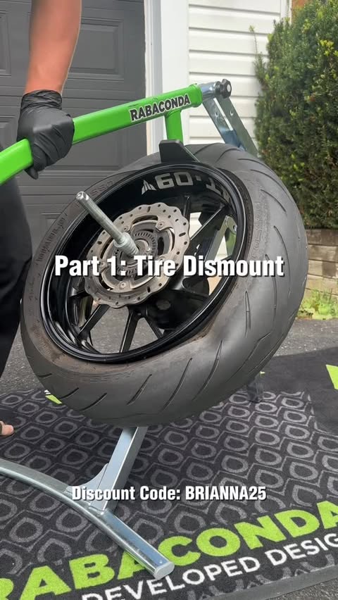 Instagram post by @breezey_d for Rabaconda. Caption reads: Changed my own tire with @rabaconda ! Watch for....