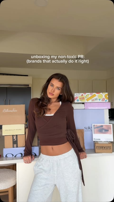 Instagram post by @katherine for Pela Case. Caption reads: unboxing my nontoxic pr 🤍 brands that actually do....