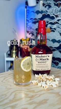 Instagram post by @likeablecocktails for Maker’s Mark. Caption reads: GOLD RUSH with @makersmark ✨
#AD

This summer, I’m....