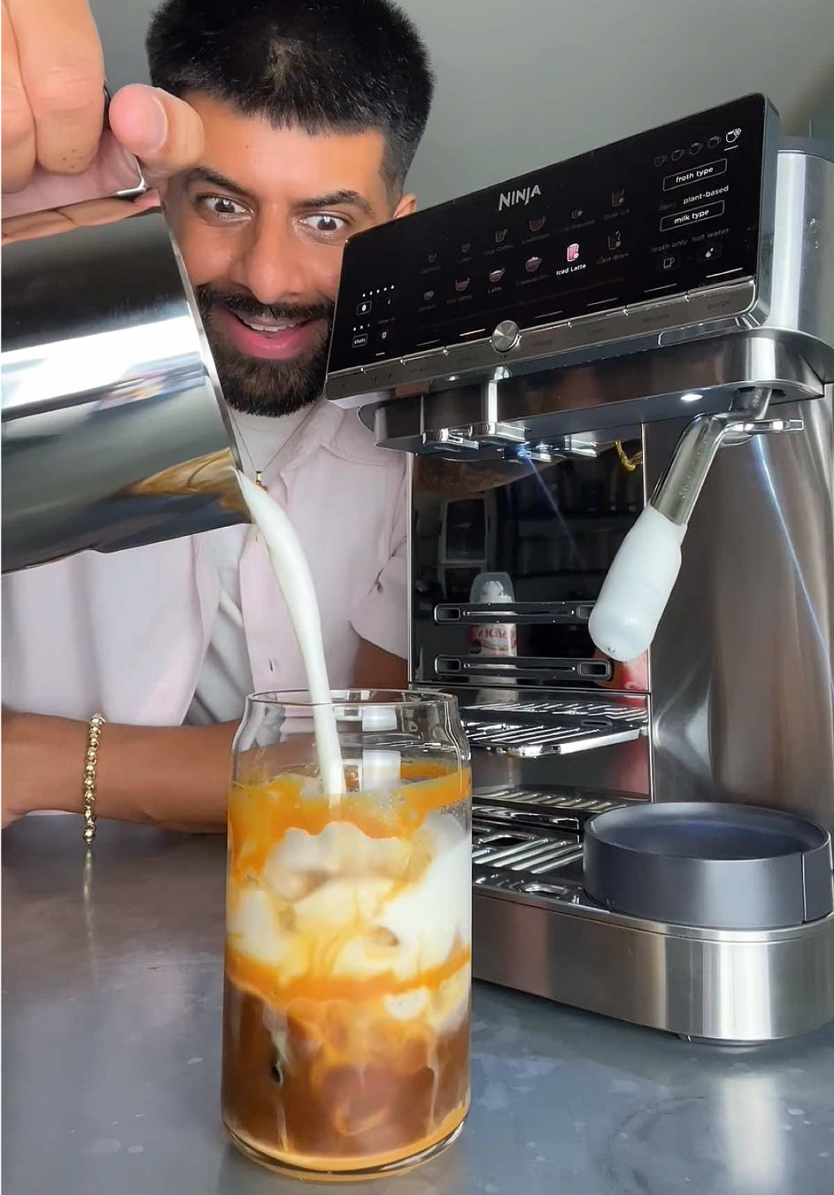 TikTok post by @lifeofdpk for Ninja Kitchen. Caption reads: The Ninja AutoBarista is now here ☕️😮‍💨 Doesn’t....