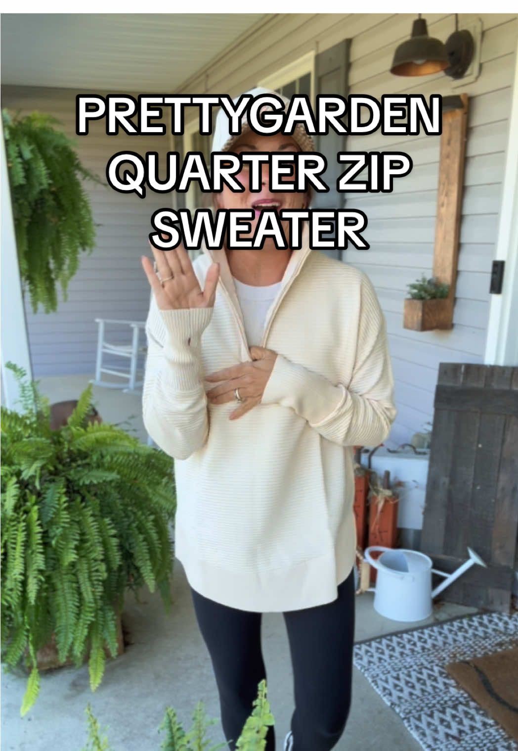 TikTok post by @caitlingrayowren for PrettyGarden. Caption reads: @PrettyGarden 👏🏻👏🏻👏🏻 #quarterzip #sweater....