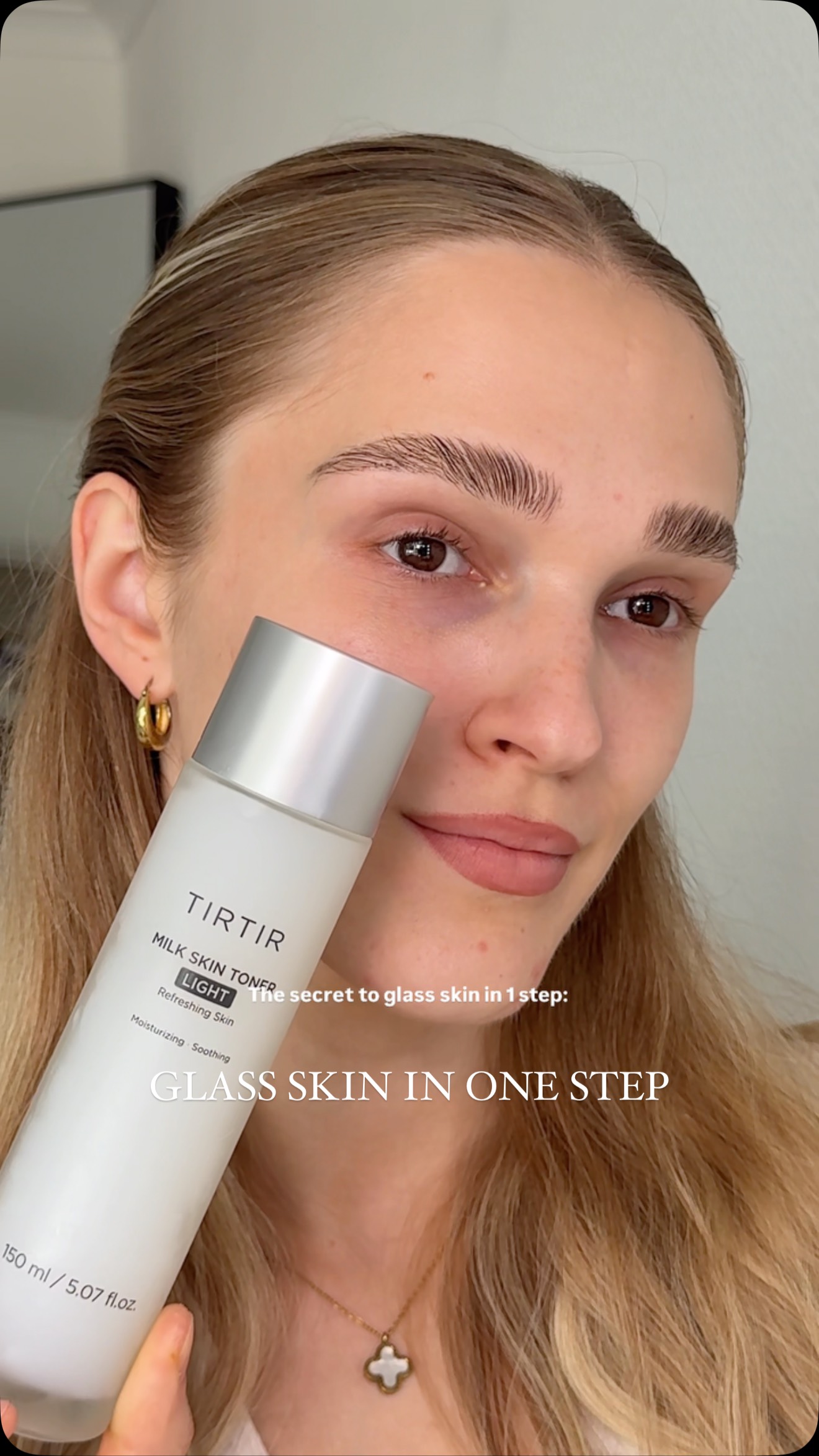 Instagram post by @itsjuliaxoxox for TIRTIR. Caption reads: Skip the steps and keep your glass skin glow🤍🥛✨....