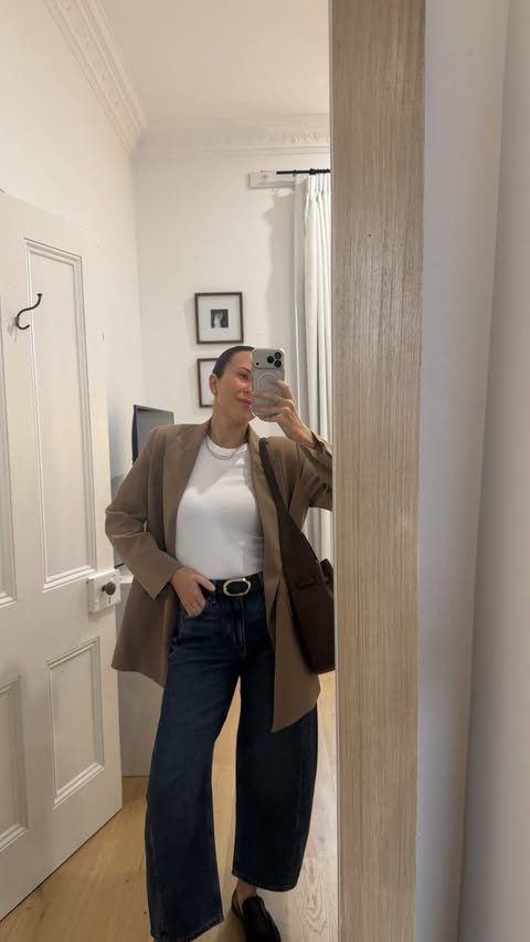 Instagram post by an influencer for Country Road. Caption reads: OOTD!!! Loving these barrel leg jeans 🤎☕️ Comment....