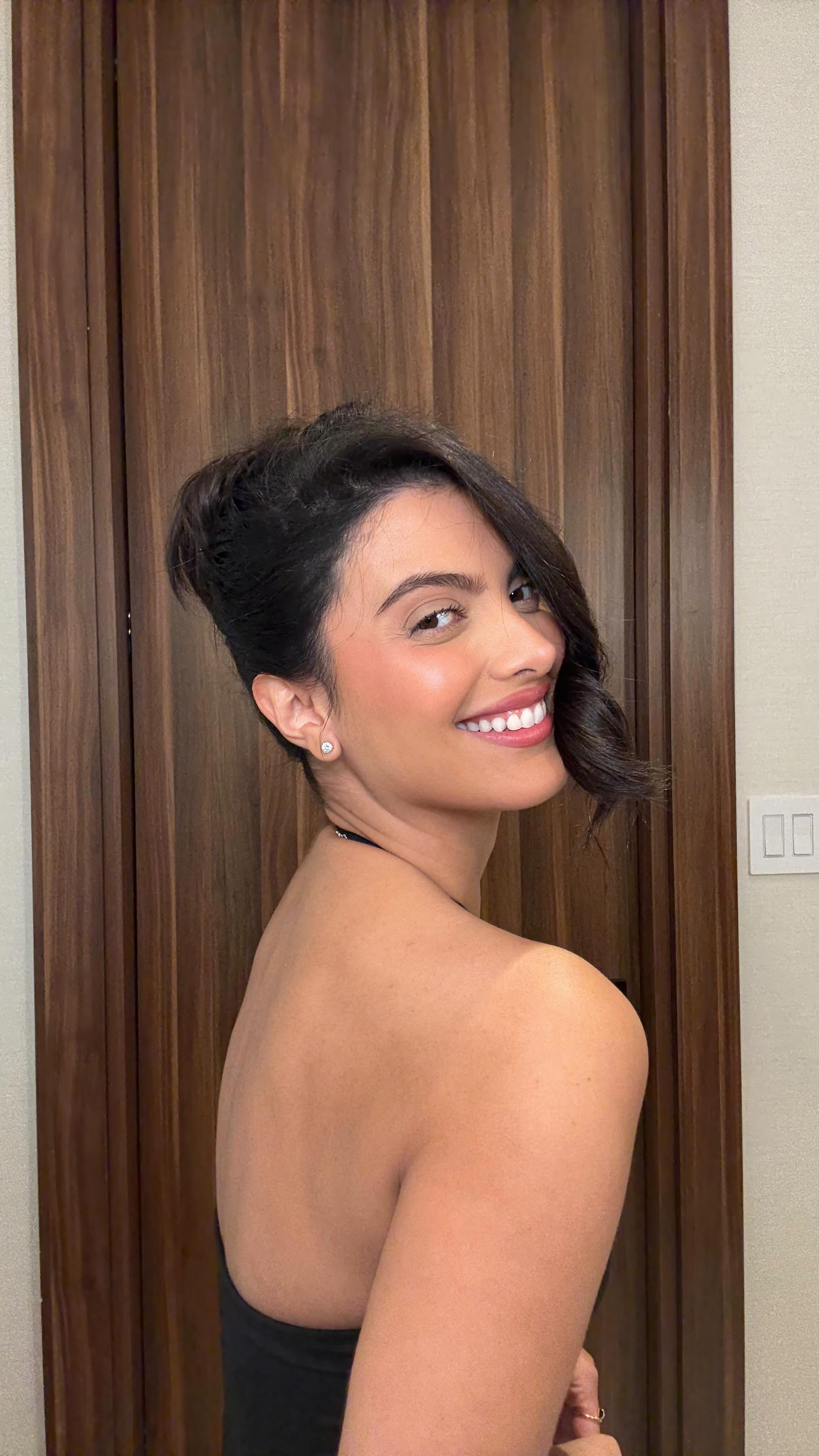 Instagram post by @marielena for Toppik. Caption reads: #ad Do you like this updo for my engagement....