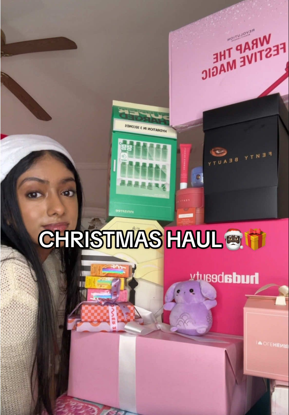 TikTok post by @anikadubeyy for Squishmallows. Caption reads: 2025 CHRISTMAS HAUL AYYYY🥰🥰🎁🎁🎄🎄🎅🏿🎅🏿....