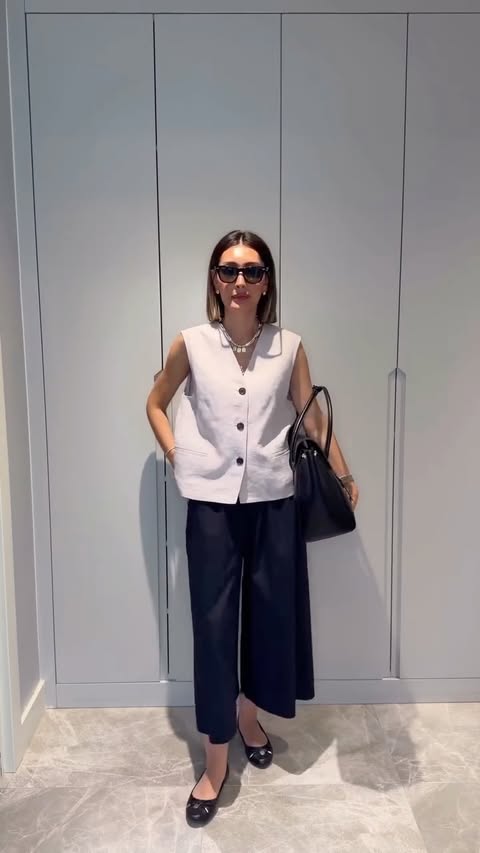 Instagram post by @esraonertuncer for Nine West. Caption reads: [...] Yelek @cosstores Pantolon @zara Babet....