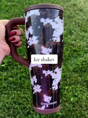 TikTok post by @shelbsfavfinds for Ice Shaker. Caption reads: [...] she said you need the cow print ICESHAKER....