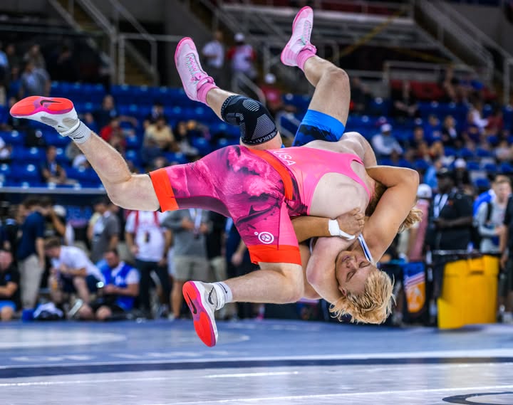 Instagram post by @usawrestling for FloWrestling. Caption reads: no notes. #fargo2026 #usawrestling | Presented by....